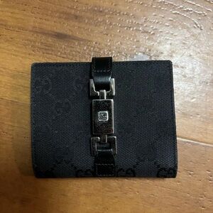 Gucci vintage Jacky wallet in canvas color black monogram print great conditions